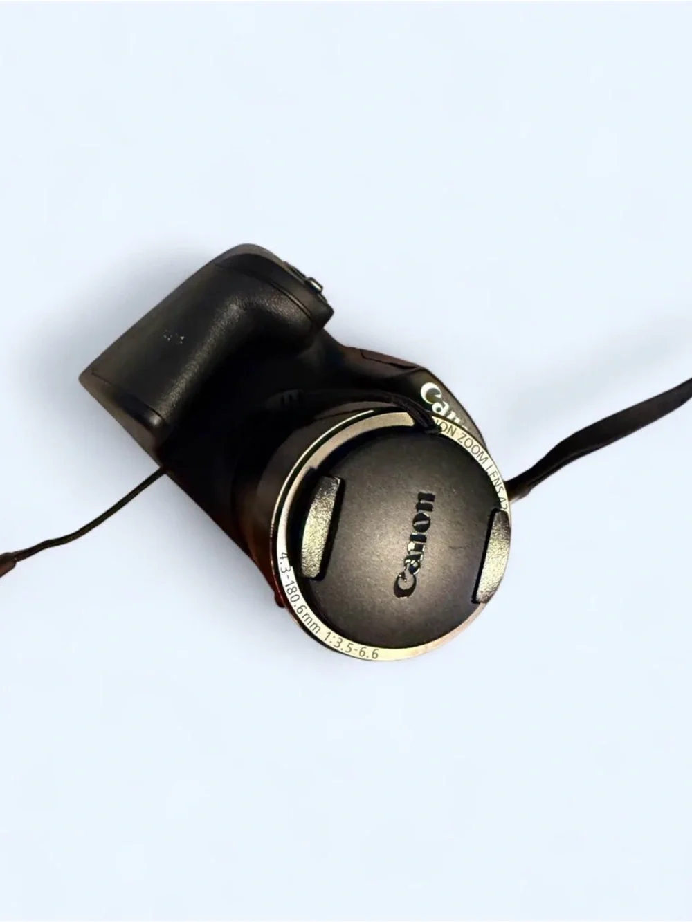 Canon PowerShot SX420 IS Digital Camera with Lens Cover, wrist wrap, and battery